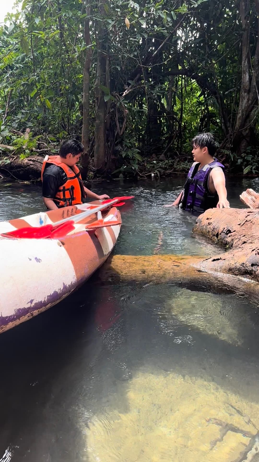 capsized kayak in the water