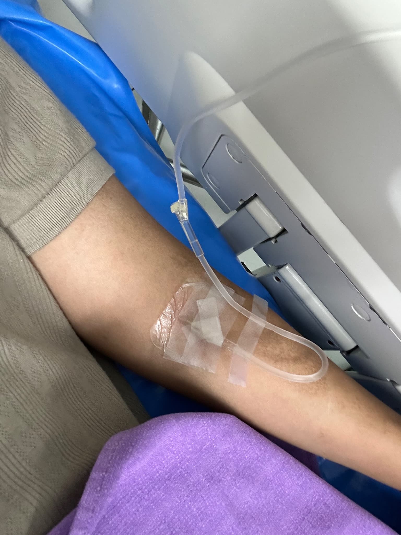 IV drip in arm