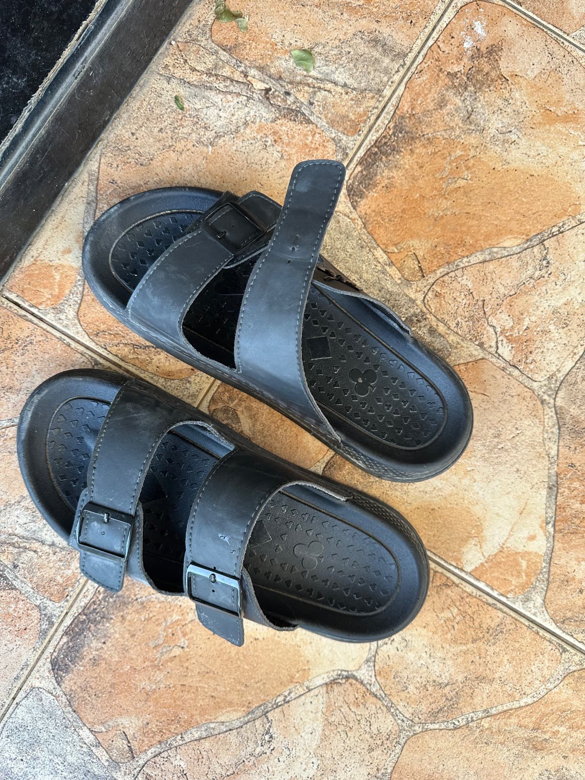 broken sandal with buckle
